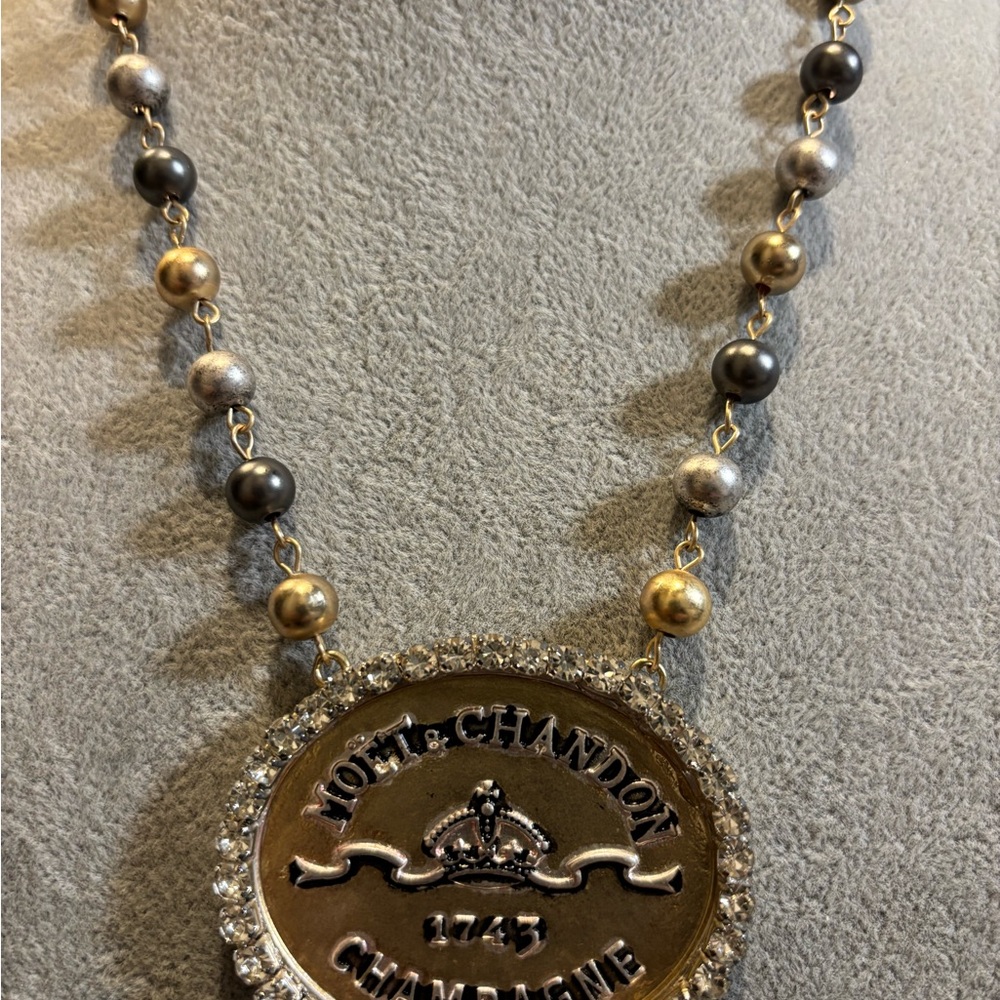 Elegant Gold and Silver Pendant Necklace